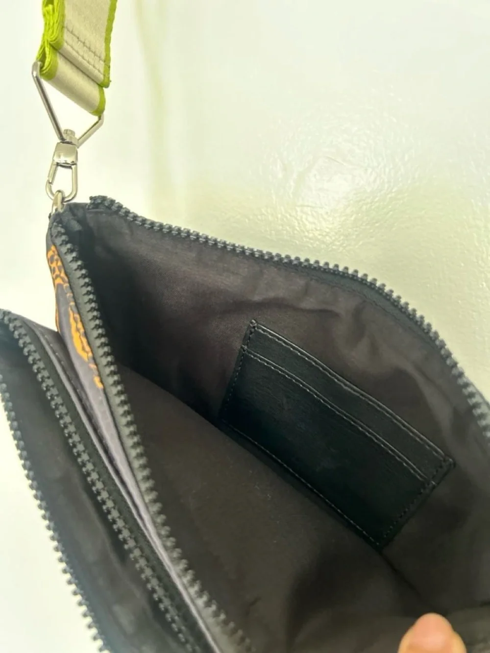 Printed Black Nylon Wristlet Pouch with Lime Accent from Parfois